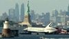 shuttle by the statue of liberty